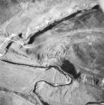 Caldercleugh, deserted farmstead: oblique air photograph under conditions of shadow.
