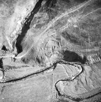 Caldercleugh, deserted farmstead: oblique air photograph under conditions of shadow.
