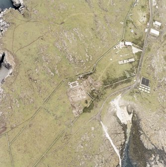 Isle of May, St Adrian's Chapel, oblique aerial view, taken from the ENE, centred on the priory and the excavations, and on the remains of a village.