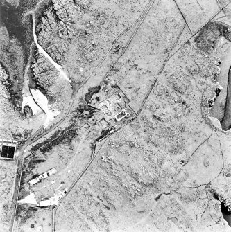 Isle of May, St Adrian's Chapel, oblique aerial view, taken from the WNW, centred on the priory and the excavations, and on the remains of a village.
