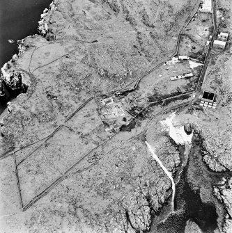 Isle of May, St Adrian's Chapel, oblique aerial view, taken from the E, centred on the priory and the excavations, and on the remains of a village.