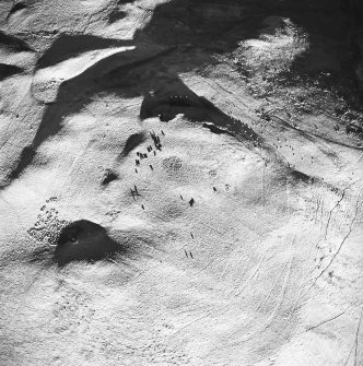 Oblique aerial view centred on the remains of the cord rig, taken from the SW.