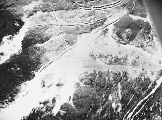 Woden Law, fort and associated monuments: air photograph under snow.
RCAHMS, 1984.
