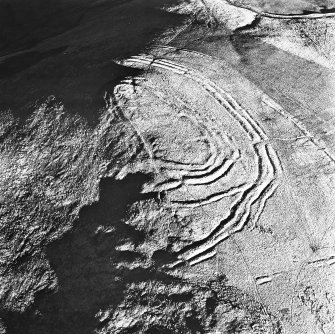 Woden Law, fort and associated monuments: air photograph under conditions of low light.
RCAHMS, 1994.
