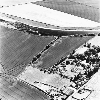 Springhill, oblique aerial view, taken from the NNE, centred on cropmarks including those of a fort.