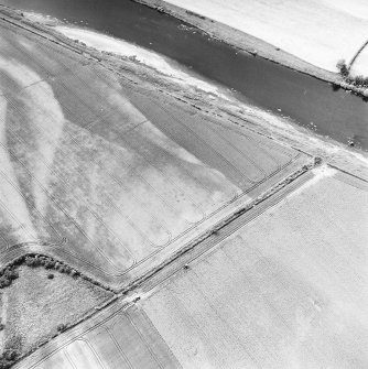Redden, oblique aerial view, taken from the ESE, centred on the cropmarks of a possible four-poster.