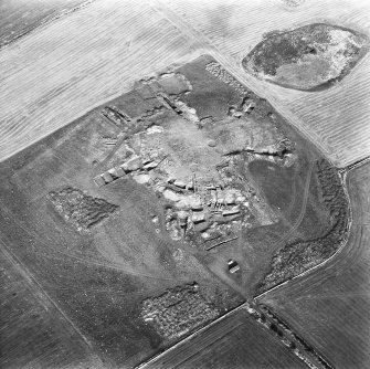 Oblique aerial view of excavations.