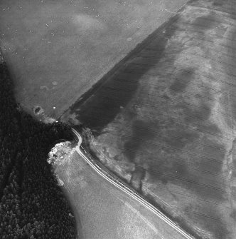 Kirklands, oblique aerial view, taken from the SW, centred on the cropmarks of possible barrows.