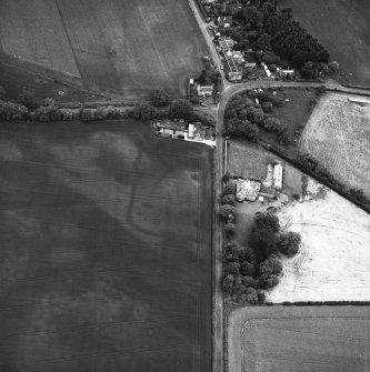 Edrom Mains, oblique aerial view taken from the SSE, centred on the cropmarks of an enclosure.