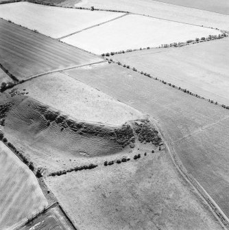 Oblique aerial view centred on the remains of the fort, taken from the N.