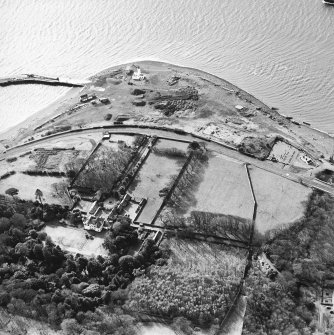 Aerial view of Lochryan House, the military headquarters, the light house, the military railway and ship yard, and the church and burial ground. View taken from the NE.