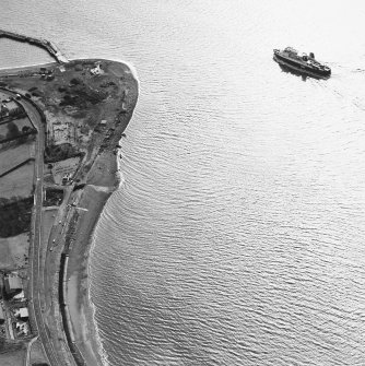 Aerial view of Lochryan lighthouse, church and burial ground, of Glen Cottage military camp, and Cairnryan military railway and ship yard. View taken from the N.