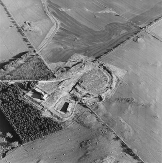 Oblique aerial view centred on the remains of the fort and tank firing platform, taken from the NW.