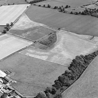 Oblique aerial view of Culvennan, taken from the NW, centered on Cropmarks.