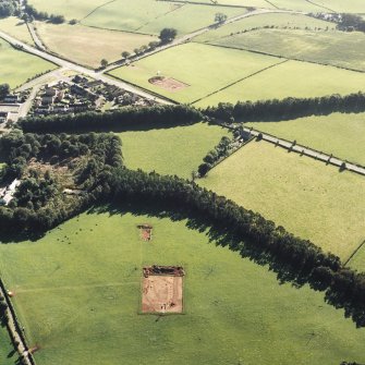 Oblique aerial view of Holywood centred on the excavation of two cursuses and The Twelve Apostles stone circle, taken from the NNE.