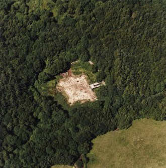 Oblique aerial view centred on the excavation of the old castle, taken from the SE.