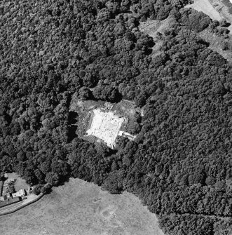Oblique aerial view centred on the excavation of the old castle, taken from the ESE.