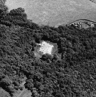 Oblique aerial view centred on the excavation of the old castle, taken from the WNW.