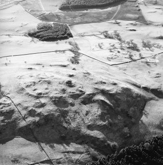Oblique aerial view centred on the remains of the fort, taken from the ENE.