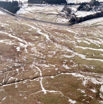 Raeburnfoot, oblique aerial view, taken from the ESE, centred on the bank barrow.