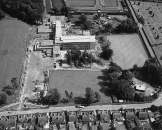 Aerial photograph showing view of site prior to completion.
Stamped on verso: 'Photographed by Planair on 29 Jun 1966. 2 N E Circus Place, Edinburgh, 3. CA;. 4459'.