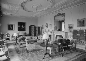 Interior view of Balcaskie House showing drawing room with fireplace.