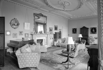 Interior view of Balcaskie House showing drawing room with fireplace.