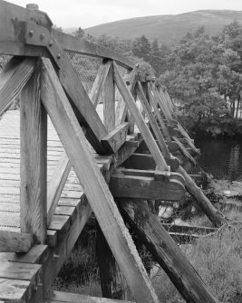 Garve Wooden Truss Road Bridge, oblique view of parapet and trestle outriders (downstream side).