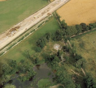 Oblique aerial view of the remains of Stoneyfield cairn.