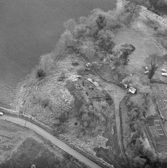 Oblique aerial view of Barton Hill motte under excavation.