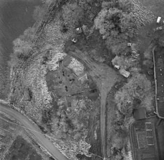 Oblique aerial view of Barton Hill motte under excavation.
