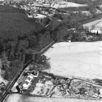 Oblique aerial view of Tulloch Knowe cairn
