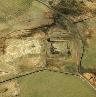 Oblique aerial view centred on Auchen Castle from N.