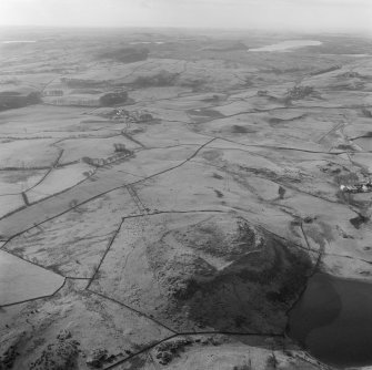 Oblique aerial view of the remains of Duncarnock fort.
