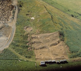 Oblique aerial view of the excavations at Kaimes Hill fort.