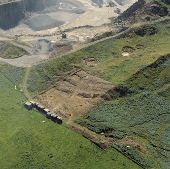 Oblique aerial view of the excavations at Kaimes Hill fort.