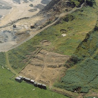 Oblique aerial view of the excavations at Kaimes Hill fort.