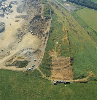 Oblique aerial view of the excavations at Kaimes Hill fort.