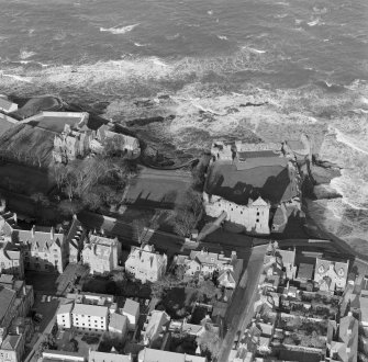 Oblique aerial view centred on the remains of St Andrews Castle.