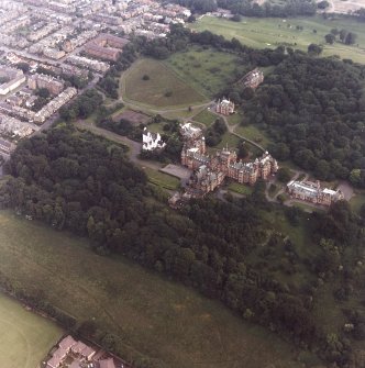 Oblique aerial view centred on Craig House, Old Craig House, South Craig Villa, Bevan House, East Craig and Queen's Craig.