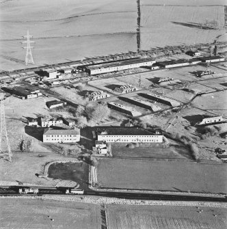 Bowhouse armament depot and factory, oblique aerial view, centred on the administrative buildings and ruined farmstead.