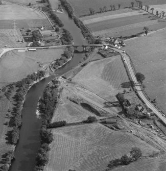 Oblique aerial view of Pert Old Parish Church and graveyard and Upper North Water Bridge with the new bridge under construction.