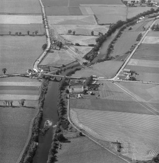 Oblique aerial view of Pert Old Parish Church and Upper North Water Bridge with the new bridge under construction.