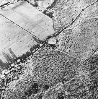 Moss Farm Road, oblique aerial view, taken from the WSW, centred on the cairn.