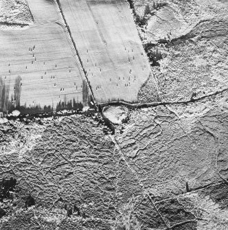 Moss Farm Road, oblique aerial view, taken from the SSW, centred on the cairn.