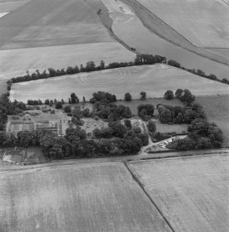 Oblique aerial view of the cropmarks at Springhill including a fort.