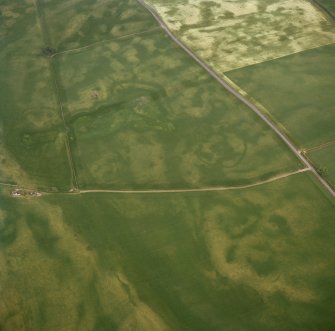 Oblique aerial view of the cropmarks at Kirklands