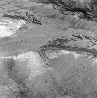 Oblique aerial view of the remains of Ben Effrey fort.
