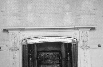 Interior view of Montgomerie House showing round room fireplace.