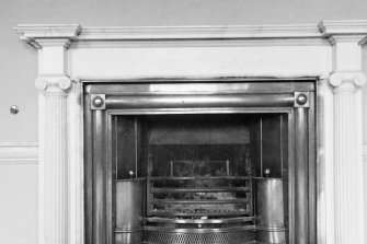 Interior view of Montgomerie House showing dining room fireplace.